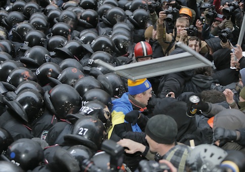 Protesters clash with police outside the presidential office