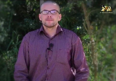 A man, who identified himself as Luke Somers, speaks in this still image taken from video purportedly published by Al Qaeda in the Arabian Peninsula (AQAP)