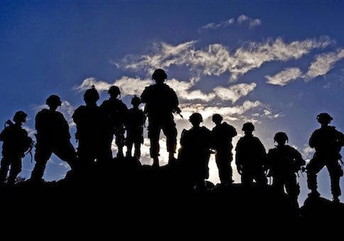 Soldiers watch troop movements during Green Flag-West at the National Training Center, Fort Irwin, California