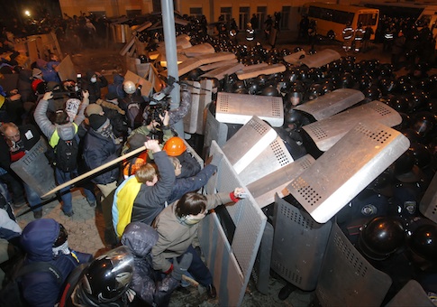Protesters clash with police guarding the presidential administration building