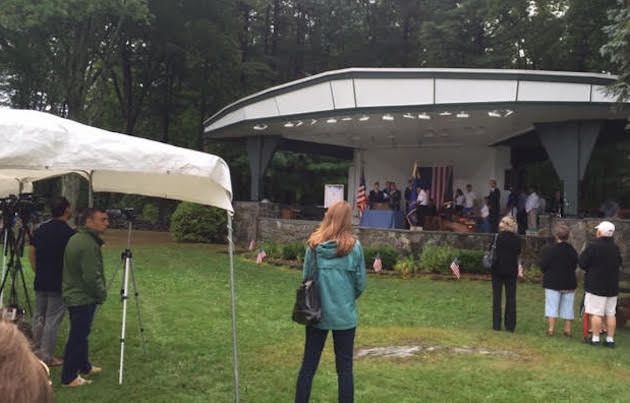N.H. Democratic Party staffer Joel Kasnetz, left, films Jeb Bush at 9/11 remembrance ceremony