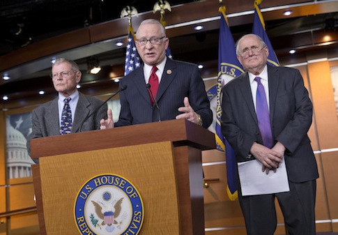 McKeon discussing NDAA with Senate Armed Services Committee Chairman Carl Levin, (D., Mich.) andSen. James Inhofe (R-Okla.) / AP