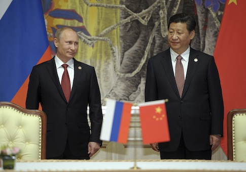 Russia's President Putin and China's President Xi Jinping attend a signing ceremony in Shanghai