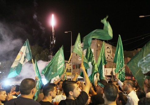 Palestinians celebrate the newly agreed cease-fire between Israel and Gaza