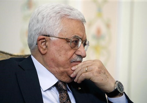 Palestinian President Mahmoud Abbas attends a meeting with Russian President Vladimir Putin at the Novo-Ogaryovo residence outside Moscow, April 13, 2015. REUTERS/Sergei Ilnitsky/Pool