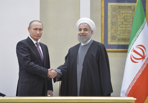 Russian President Vladimir Putin and his Iranian counterpart Hassan Rouhani attend a news conference in Tehran