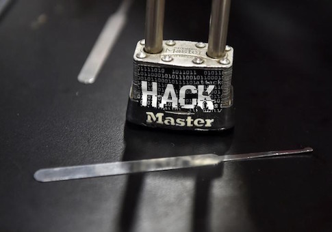 A padlock is displayed at the Alert Logic booth during the 2016 Black Hat cyber-security conference in Las Vegas