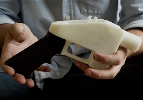 Cody Wilson holds what he calls a Liberator pistol