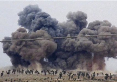 Smoke rises after airstrikes in Kafr Nabel of the Idlib province, western Syria
