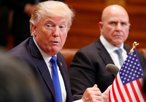 US President Donald Trump sits beside National Security Adviser HR McMaster