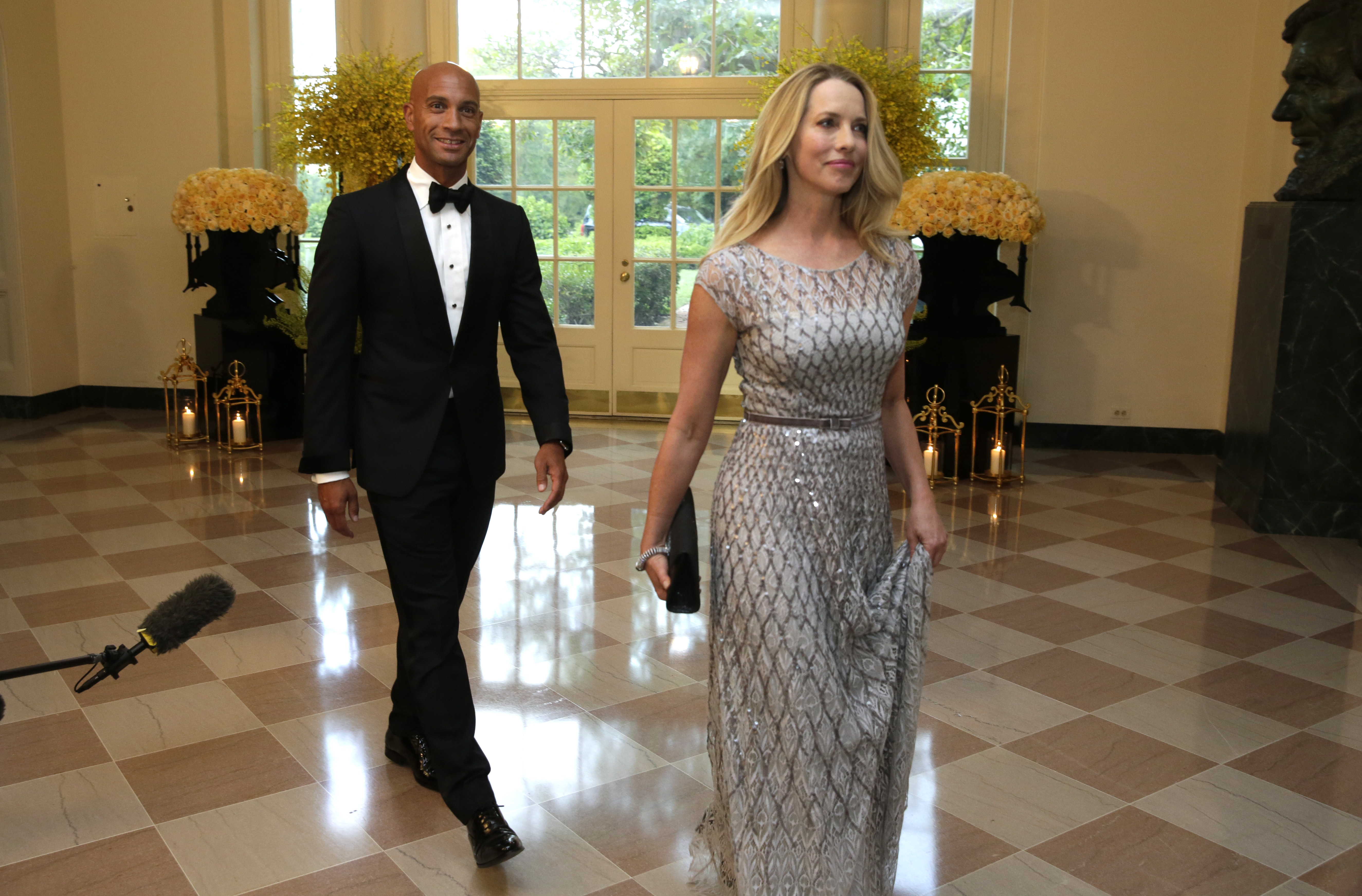 Laurene Powell Jobs and former Washington mayor Adrian Fenty