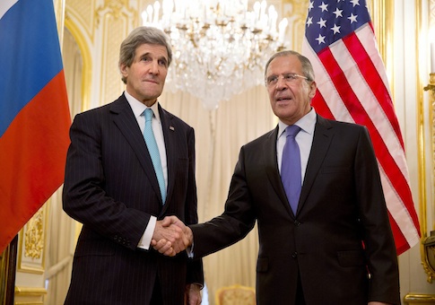 U.S. Secretary of State Kerry shakes hands with Russian Foreign Minister Lavrov at the Russian Ambassador's residence in Paris