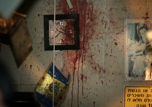 Blood stains are seen at the site of a suicide bombing in Tel Aviv