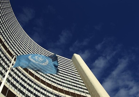 The flag of the International Atomic Energy Agency IAEA flies in front of its headquarters during a board of governors meeting in Vienna