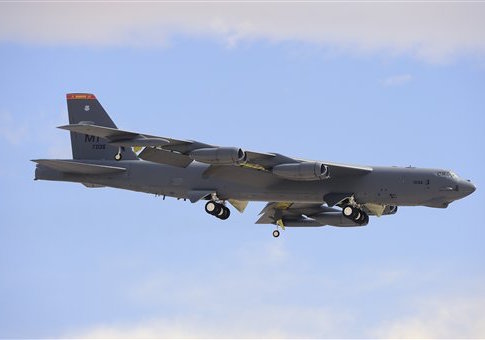 A Boeing B-52H Stratofortress prepares for landing.