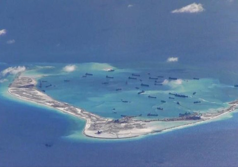 Still image from United States Navy video purportedly shows Chinese dredging vessels in the waters around Mischief Reef in the disputed Spratly Islands
