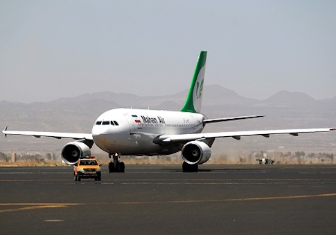 An airplane of Mahan Air sits at the tarmac