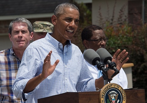 US President Barack Obama speaks after touring a flood-affected area in Baton Rouge, Louisiana, on August 23, 2016 / Getty Images