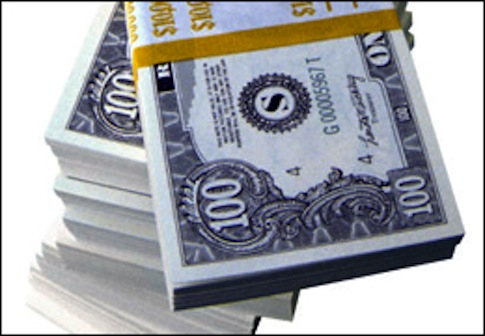 Stacks of cash / Wikimedia Commons
