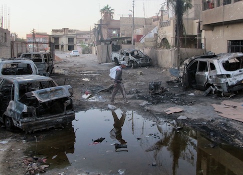A car bomb's aftermath after an October 2013 attack in Baghdad