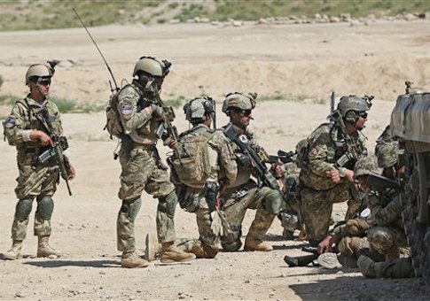 Afghan National Army (ANA) soldiers prepare to participate in a military exercise on the outskirts of Kabul