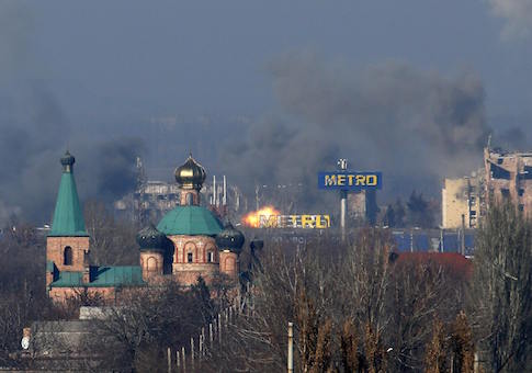 Smoke rises above an old terminal and an administrative building of the Sergey Prokofiev International Airport after the recent shelling during fighting between pro-Russian separatists and Ukrainian government forces in Donetsk, eastern Ukraine