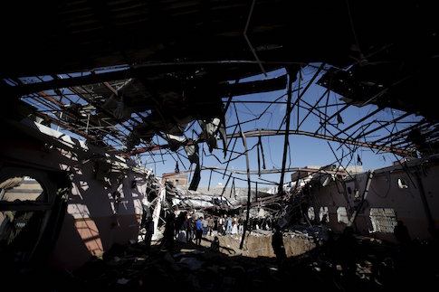 People gather at wedding hall after it was hit by a Saudi-led air strike in Yemen's capital Sanaa