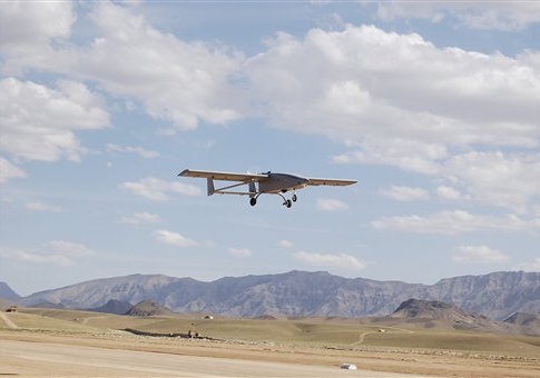 A Tiger Shark unmanned aerial vehicle prepares for landing.