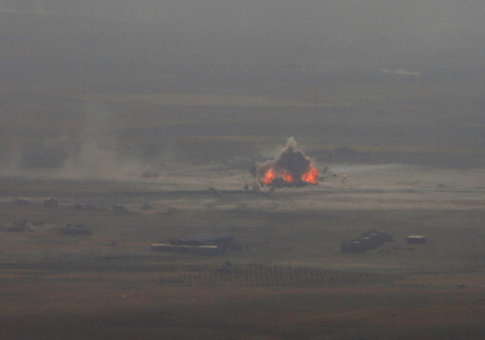 A car bomb attack is seen in the east of Mosul during clashes with Islamic State militants