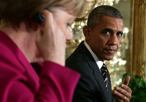 German Chancellor Angela Merkel (L) and former U.S. President Barack Obama / Getty