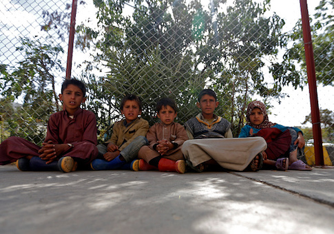 Yemeni children sit at Sabaeen Hospital in Sanaa, where cholera-infected patients are receiving treatment