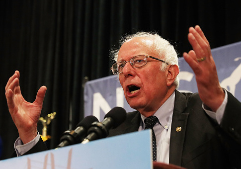 Senator Bernie Sanders addresses the New York delegation at the Democratic National Convention (DNC) on July 26, 2016 in Philadelphia, Pennsylvania / Getty Images
