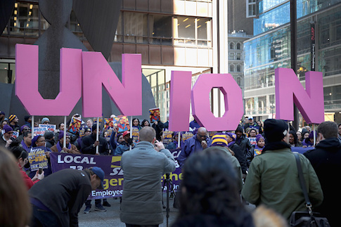 Members of the SEIU hold a rally