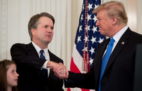 Brett Kavanaugh shakes hands with President Donald Trump