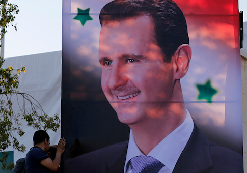 Assad poster