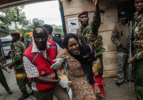 A woman is rescued from the Dusit Hotel