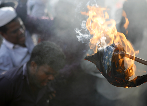 Flag’s Fumes Kill Protestor
