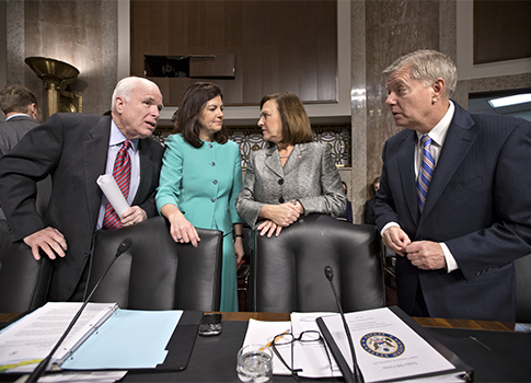 Hagel Clears Committee on Party-Line Vote