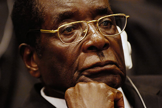 Men Charged with Illegally Lobbying Lawmakers for Robert Mugabe