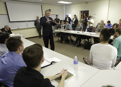 Newspaper Schools McAuliffe on His Poor Grammar