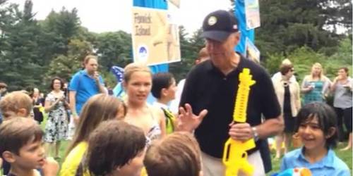 EXCLUSIVE: Joe Biden Wields Military-Style Assault Weapon in a Crowd of Children