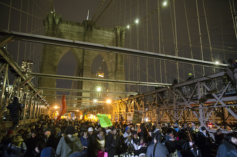 Taxpayer Funded Poet Accused of Assaulting Cops, Inciting Riot