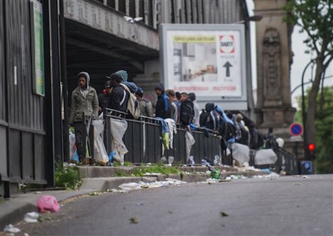 French Police Dismantle Migrant Camps in Paris, Calais