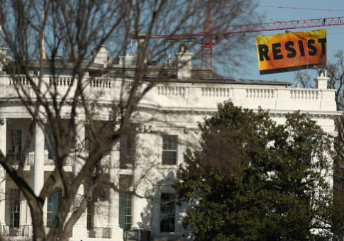 Greenpeace Protesters Scale Crane in DC, Causing Police to Shut Down Streets