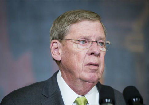 Activists Hold Protest Against Senator With Parkinson's After He Has Surgery