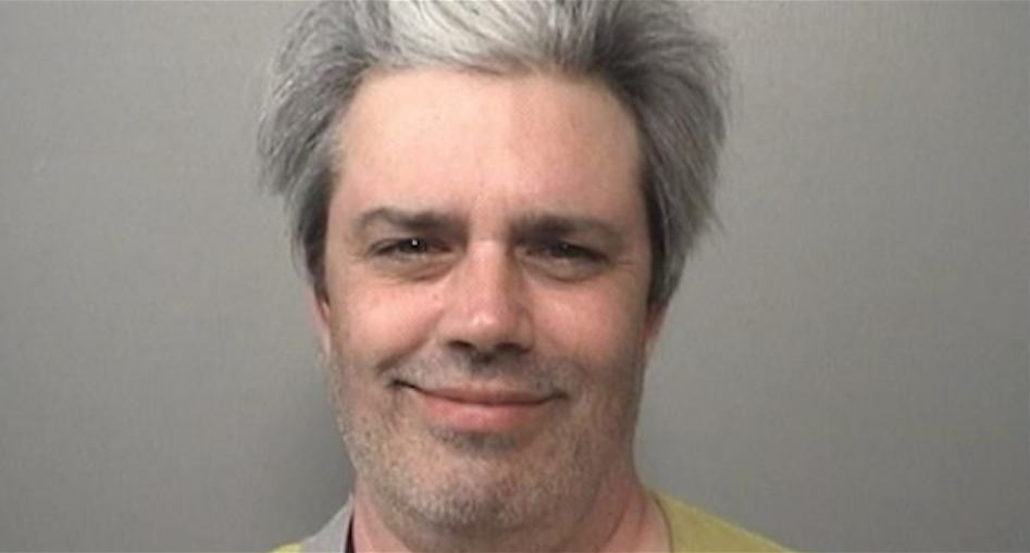 Dem Candidate Has Smug Look on His Face in Mugshot. But What He's Charged with Is No Laughing Matter