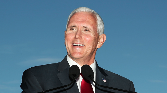 Guess What Protesters Are Trying to Say About Mike Pence By Showing Up to His Speech in "Handmaiden" Costumes