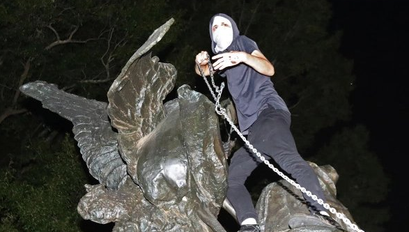 Anti-Confederacy Protesters Desecrate a Monument. Then Learn the Statue Stands for Peace