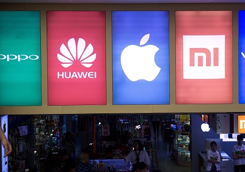 Apple Appeasing Communist Chinese Regulators as CEO Tim Cook Hits Trump