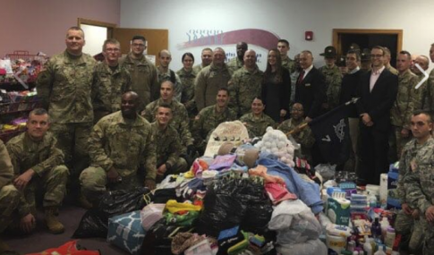 Army Reservists March With Donations for Children to Non-Profit